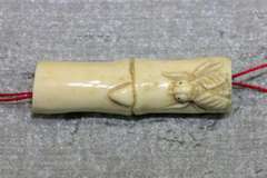 Hand-carved Fly on Bamboo