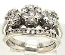 LADIES 14 KT WHITE GOLD WEDDING SET.