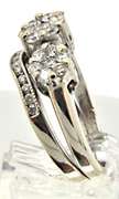 LADIES 14 KT WHITE GOLD WEDDING SET.