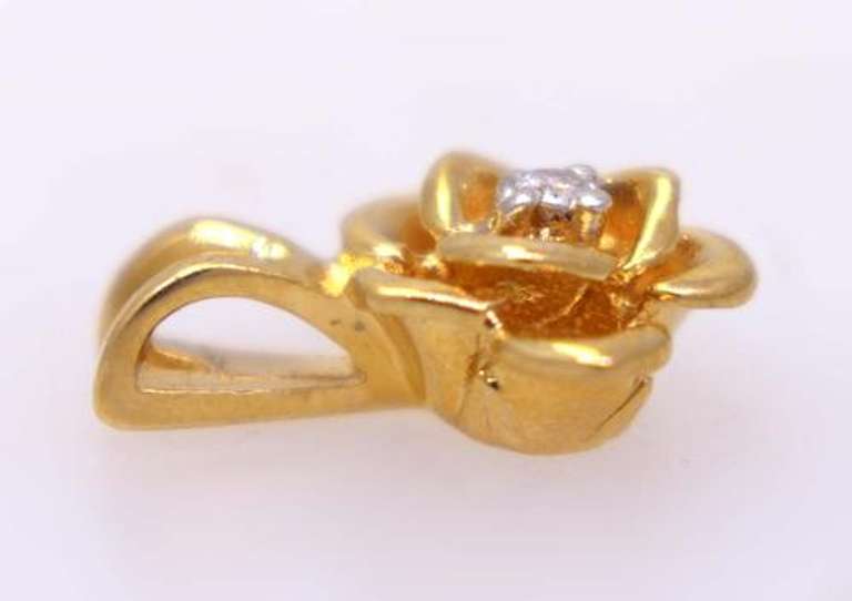 Gold Flower Pendant with Diamond
