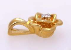 Gold Flower Pendant with Diamond