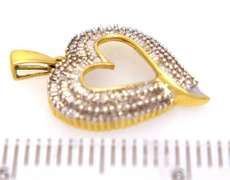 Sparkling Diamond Heart Pendant in Gold