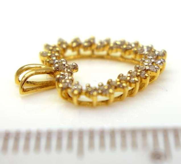 Diamond Heart Pendant in Gold