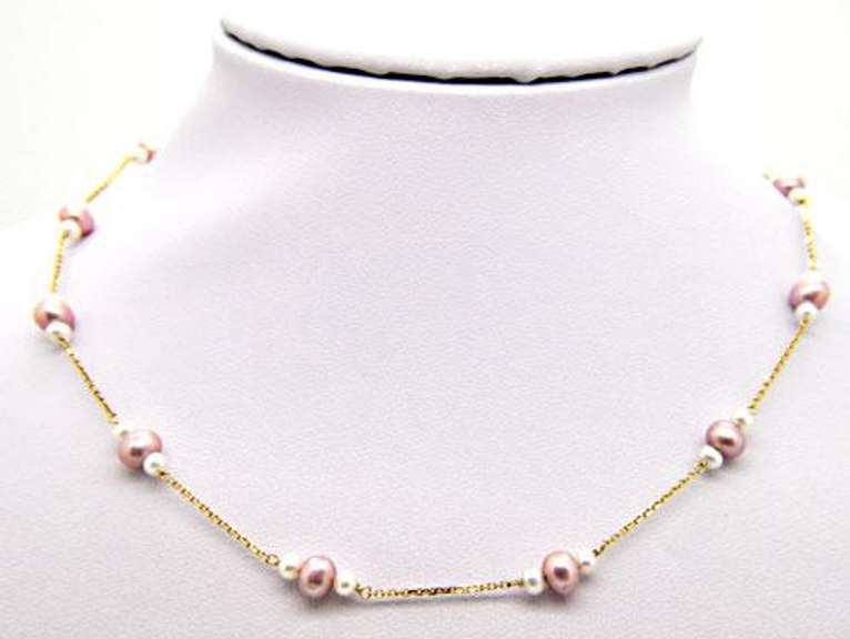 LADIES 14 KT YELLOW GOLD PEARL STATION NECKLACE.