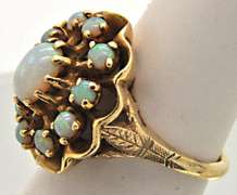 LADIES 14 KT YELLOW GOLD OPAL RING.