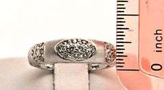 LADIES 18K WHITE GOLD DIAMOND BAND SATIN FINISH.