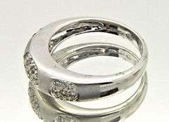 LADIES 18K WHITE GOLD DIAMOND BAND SATIN FINISH.