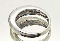 LADIES 18K WHITE GOLD DIAMOND BAND SATIN FINISH.