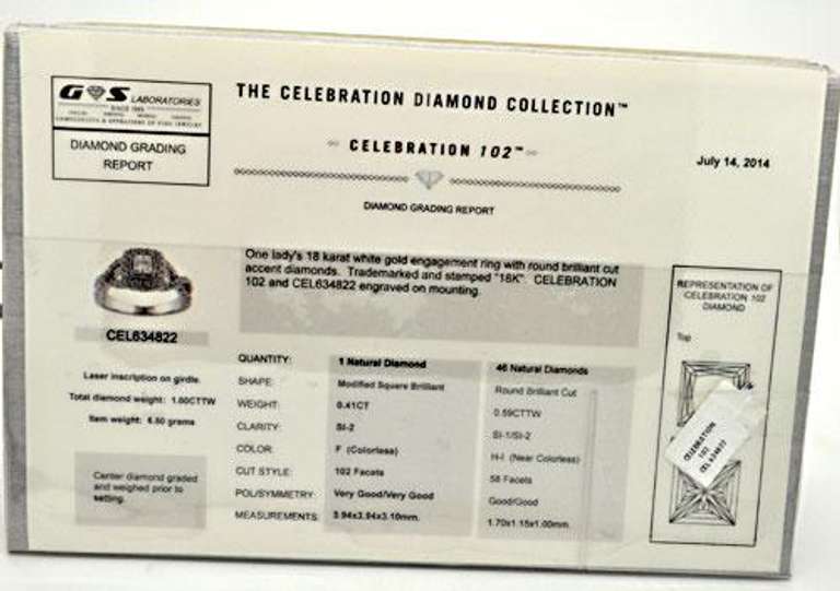 LADIES 18 KT WHITE GOLD DIAMOND ENGAGEMENT RING.