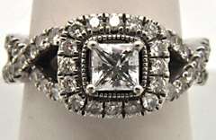 LADIES 18 KT WHITE GOLD DIAMOND ENGAGEMENT RING.