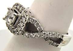 LADIES 18 KT WHITE GOLD DIAMOND ENGAGEMENT RING.
