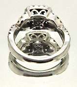 LADIES 18 KT WHITE GOLD DIAMOND ENGAGEMENT RING.