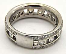 LADIES 18KT WHITE GOLD DIAMOND BAND.
