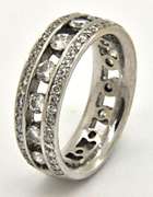 LADIES 18KT WHITE GOLD DIAMOND BAND.