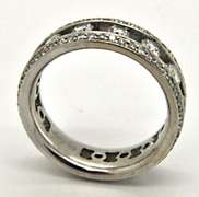 LADIES 18KT WHITE GOLD DIAMOND BAND.