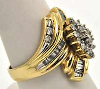 LADIES 14KT GOLD AND DIAMOND COCTAIL RING.