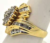 LADIES 14KT GOLD AND DIAMOND COCTAIL RING.