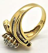LADIES 14KT GOLD AND DIAMOND COCTAIL RING.