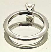 TIFANNY AND CO. PLATINUM ENGAGEMENT RING.