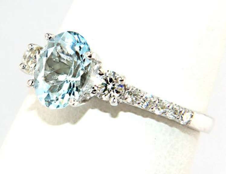 Stylish Aquamarine and Diamond Shared Prong Ring