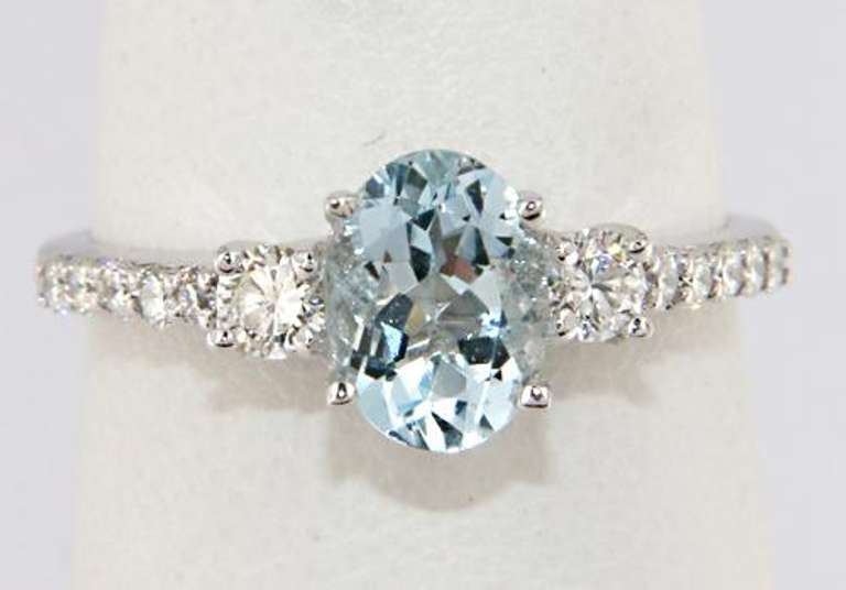 Stylish Aquamarine and Diamond Shared Prong Ring