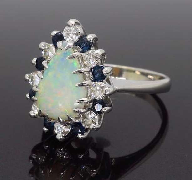 Halo Style Opal, Sapphire and Diamond Ring