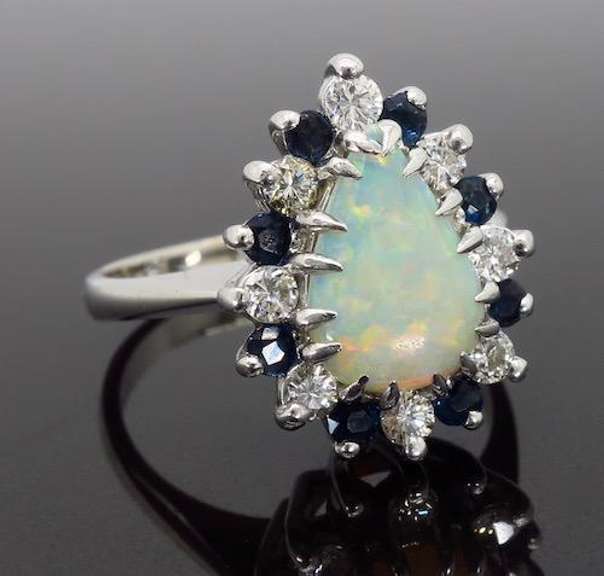 Halo Style Opal, Sapphire and Diamond Ring