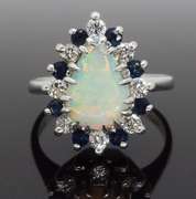 Halo Style Opal, Sapphire and Diamond Ring