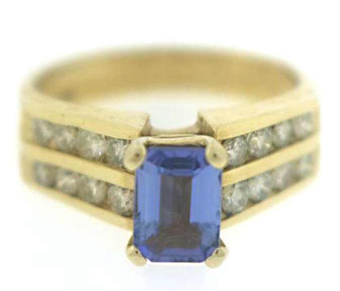 Stunning Tanzanite and Diamond Channel Set Diamond Ring