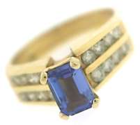 Stunning Tanzanite and Diamond Channel Set Diamond Ring
