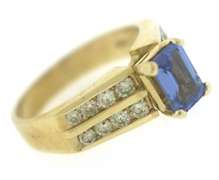 Stunning Tanzanite and Diamond Channel Set Diamond Ring