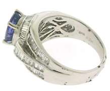 Shining 14kt WG Oval Tanzanite & Baguette Diamond Ring