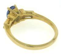 Glowing 14kt YG Emerald Cut Tanzanite and Diamond Ring