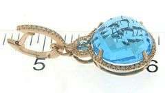 Stunning 14kt YG Blue Topaz and Diamond Halo Dangle Earrings