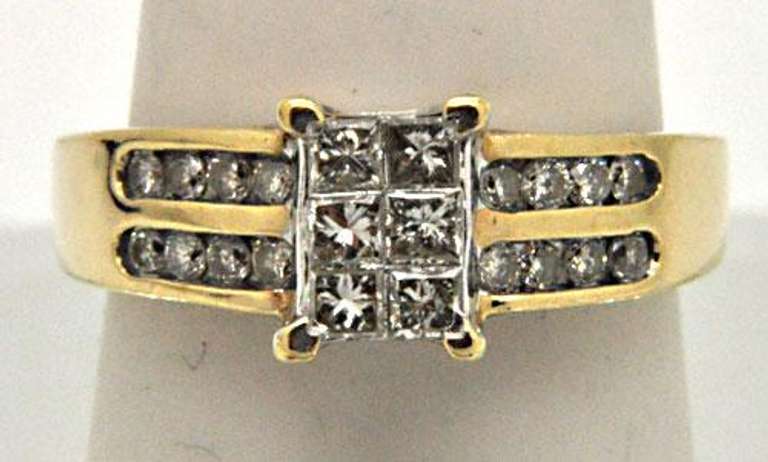 10K YELLOW GOLD LADIES DIAMOND RING.