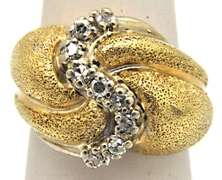 14K YELLOW GOLD DIAMOND RING.