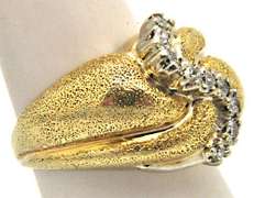 14K YELLOW GOLD DIAMOND RING.