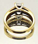 10K YELLOW GOLD LADIES DIAMOND RING.