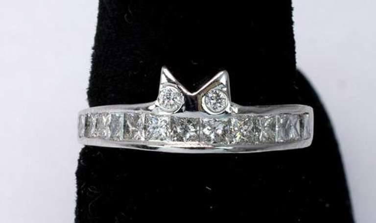 Unique 0.66CTW Diamond Band, 14KT
