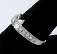 Unique 0.66CTW Diamond Band, 14KT