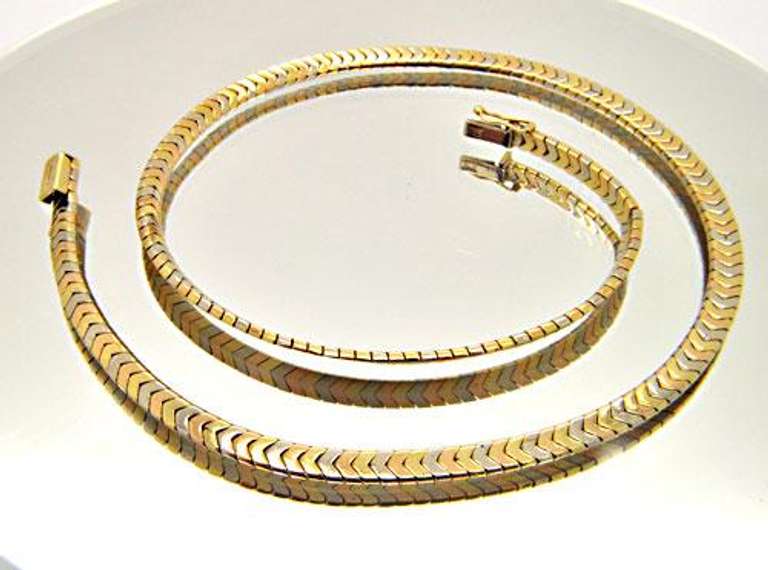 14KT TRI COLOR LADIES OMEGA NECKLACE.