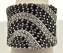 LADIES 14K WHITE GOLD BAND WITH 1.50 CARAT OF DIAMONDS.