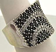 LADIES 14K WHITE GOLD BAND WITH 1.50 CARAT OF DIAMONDS.