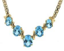 Fabulous 14kt YG Oval Cut Blue Topaz Bib Necklace