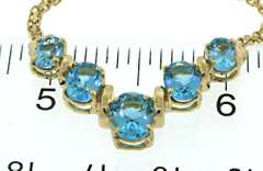Fabulous 14kt YG Oval Cut Blue Topaz Bib Necklace