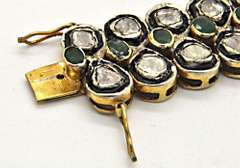 STERLING SILVER, GOLD, DIAMOND AND EMERALD BRACELET.