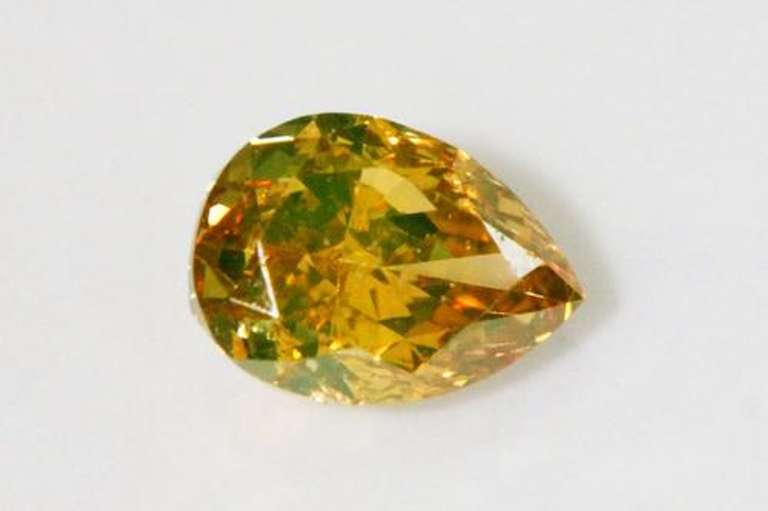 Brilliant Natural Orange Diamond - 0.44 cts.