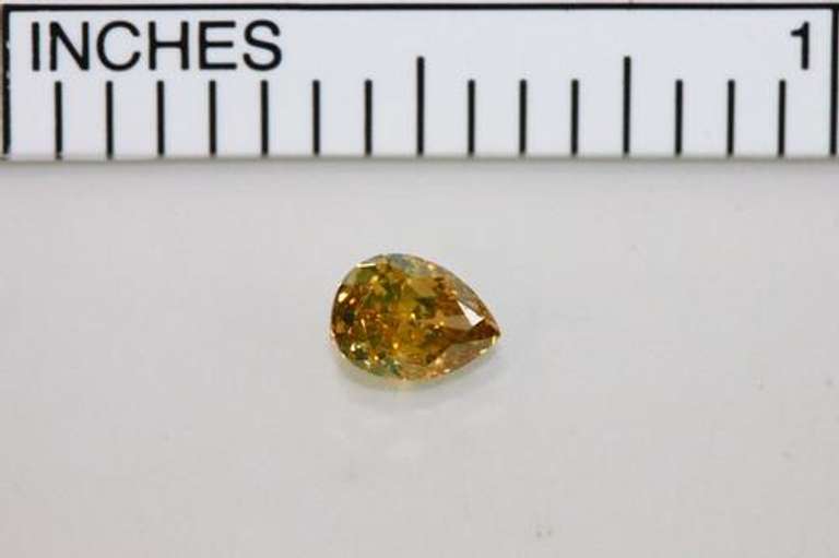 Brilliant Natural Orange Diamond - 0.44 cts.