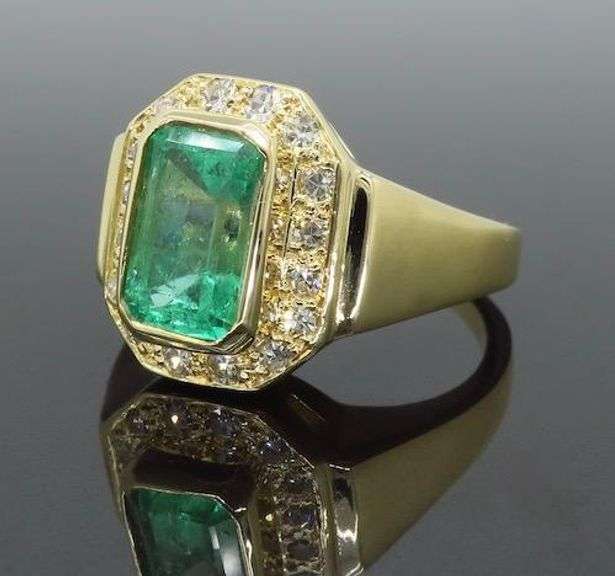 Emerald and Diamond Halo Cocktail Ring
