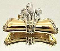 14K TWO TONE GOLD AND DIAMOND SLIDE PENDANT.